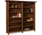 Wooden bookshelf with books and decorative items on a white background