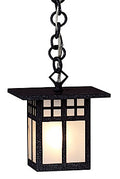 Black pendant light with glass shade on a white background