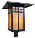 Decorative outdoor light fixture with stained glass design on a white background