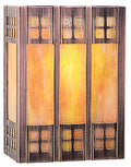 Decorative sconce with metal frame and glass panels on a white background