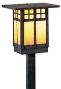 Decorative outdoor lamp with glass panels on a white background