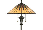 Tiffany-style floor lamp with a stained glass shade on a white background