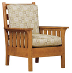 Wooden armchair with patterned cushions on a white background
