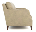 A side-view shot of a beige upholstered armchair with dark brown wooden legs, set against a plain white background.