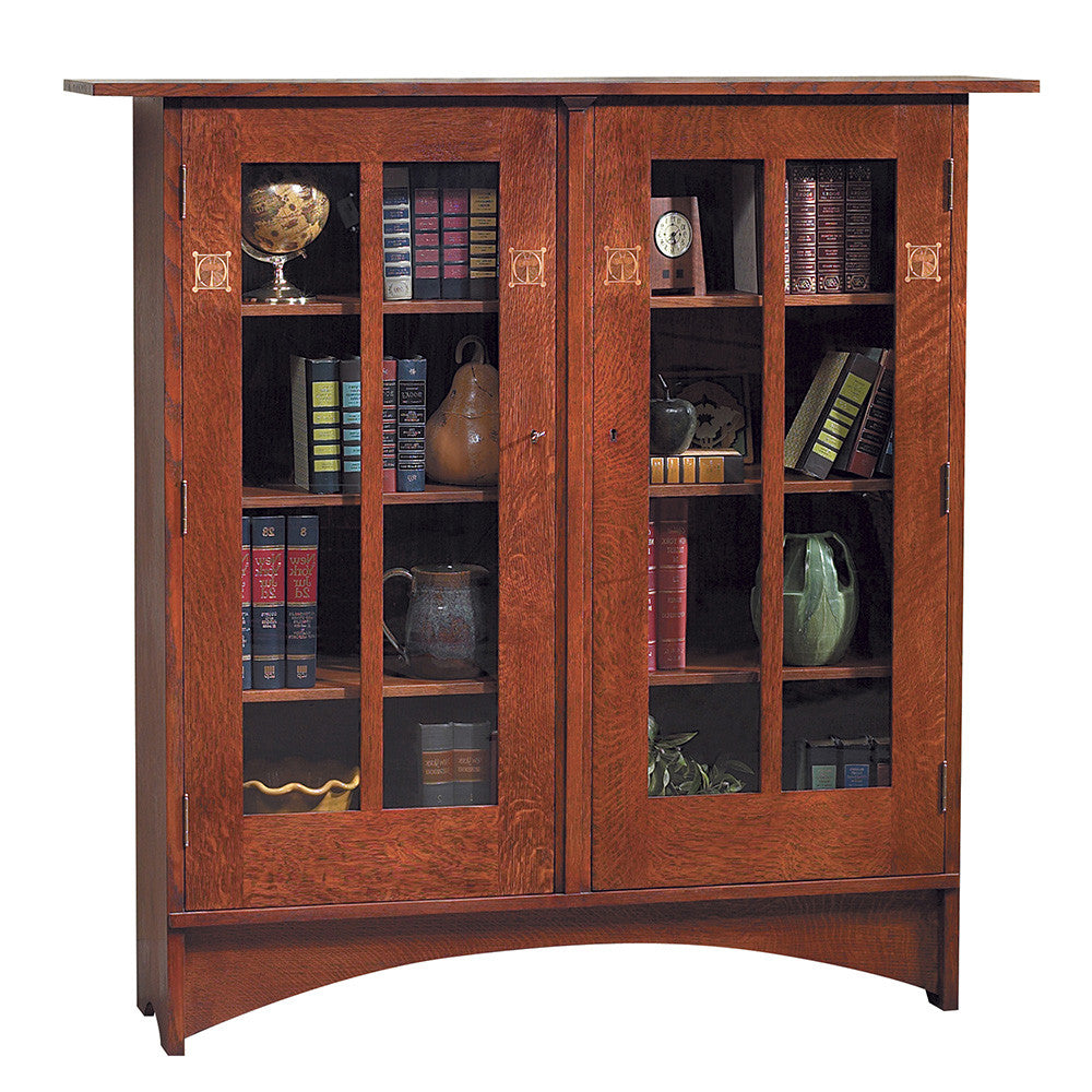 Harvey Ellis Wooden bookshelf with glass doors displaying books and decorative items on a white background