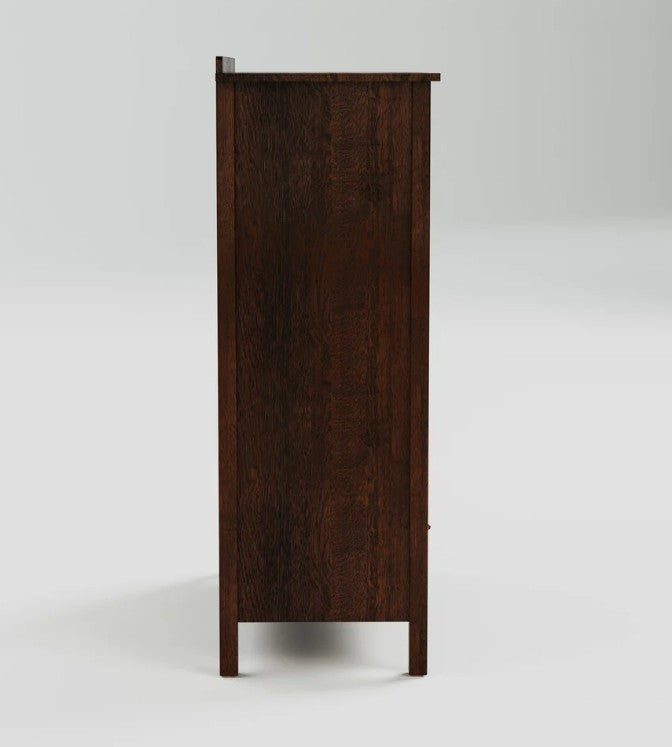 A tall, narrow dark brown wooden cabinet or armoire shown from the side against a light gray studio background.