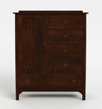 A dark brown wooden chest of drawers with a single paneled door on the left and five drawers on the right, each with a small round metal pull handle, shown against a plain light gray background.