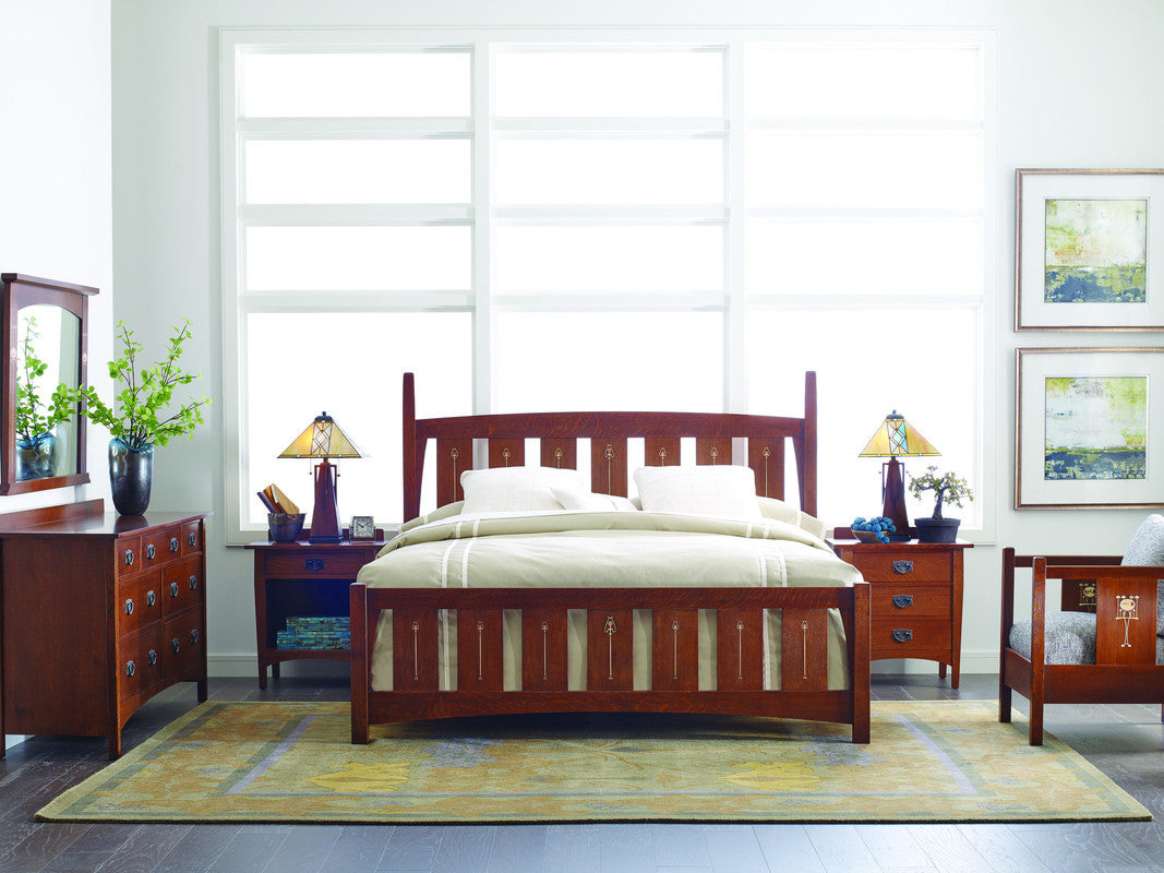 Wooden bedroom furniture set with bed, dresser, and nightstands in a room with large windows. Mid-footboard height for the Harvey Ellis bed. 