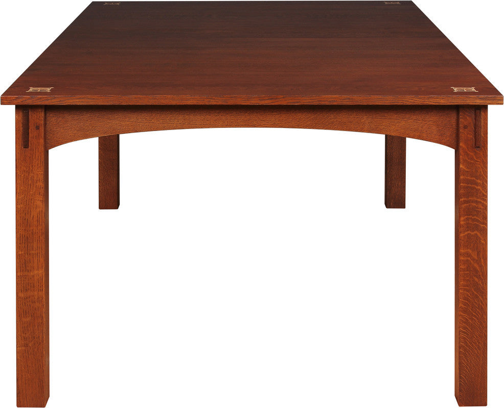 Harvey Ellis wooden dining table on a white background.