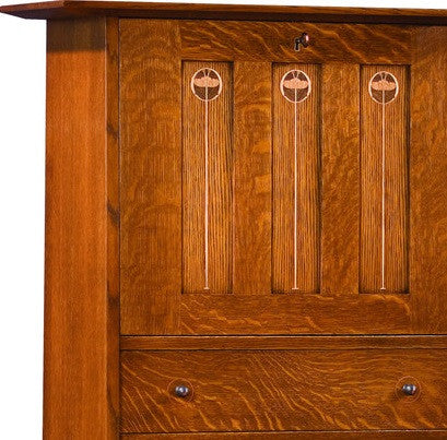 Wooden cabinet with a focus on the front panel and drawers.