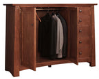 Wooden wardrobe with open doors showing hanging clothes on a white background