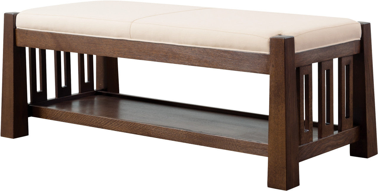Wooden bench with a beige cushion: Highlands Bench by Stickley. 