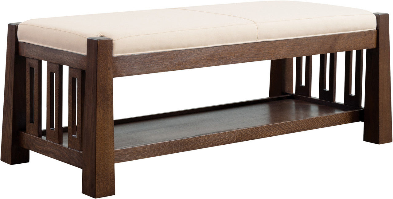 Wooden bench with a beige cushion: Highlands Bench by Stickley. 
