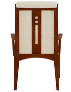 Wooden chair with a white cushion on a white background. View from the back. 