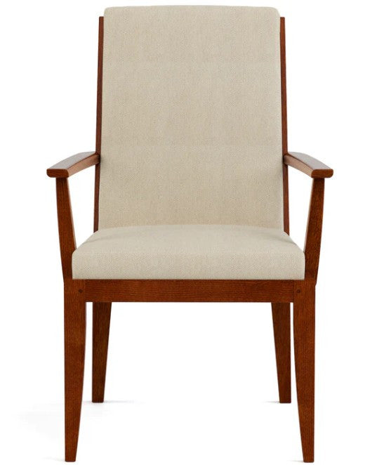 Wooden armchair with beige cushioned seat and backrest on a white background