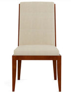 Wooden chair with beige cushioned seat and backrest on a white background