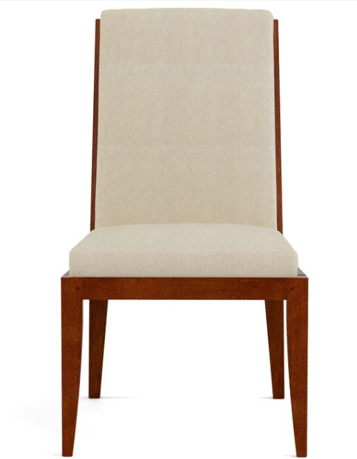 Wooden chair with beige cushioned seat and backrest on a white background