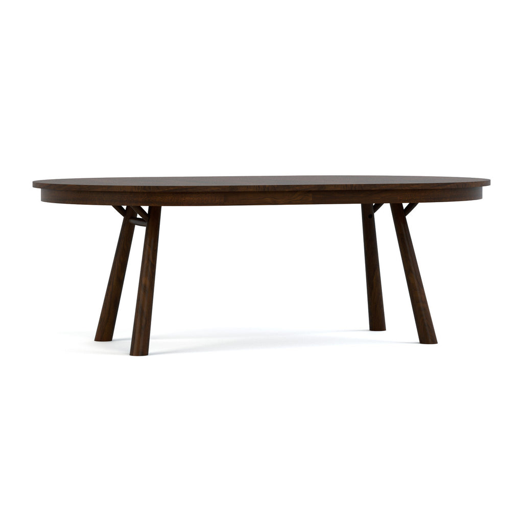 Wooden dining table with four legs on a white background