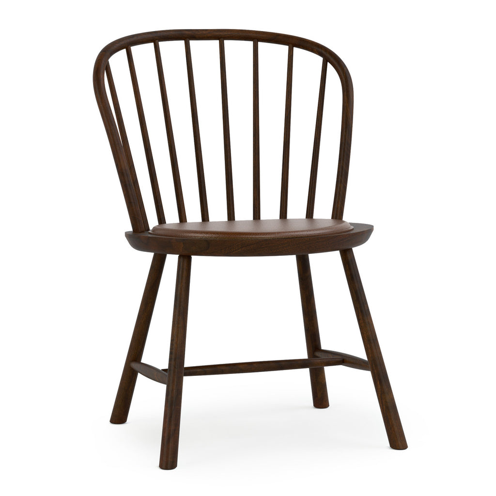 Wooden chair with spindle back design on a white background
