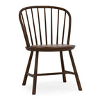 Wooden chair with spindle back design on a white background