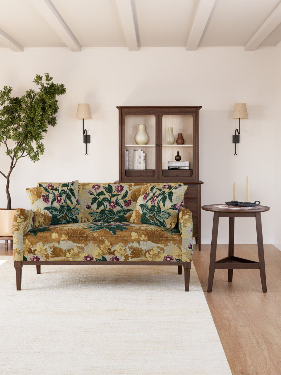 Living room with floral-patterned sofa, wooden cabinet, and side table.