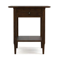 Wooden side table with a drawer on a white background