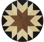 Round wooden table with a star pattern.