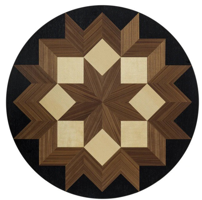 Round wooden puzzle with star pattern on a black background
