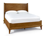 Wooden bed with white mattress and pillows on a white background