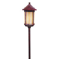 Decorative outdoor lamp post on a white background