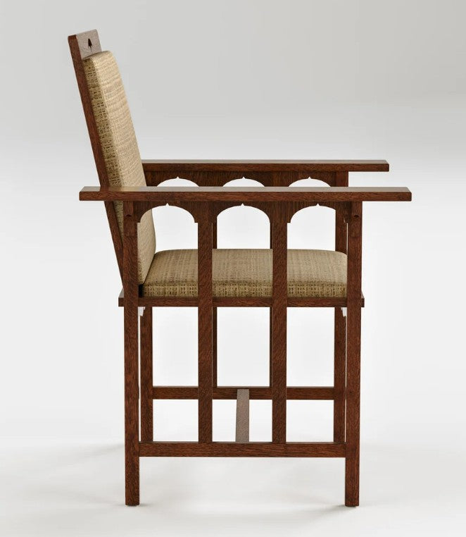 A mid-century modern wooden armchair with a dark brown frame and light beige woven upholstery on the seat and backrest, shown against a neutral light gray background.