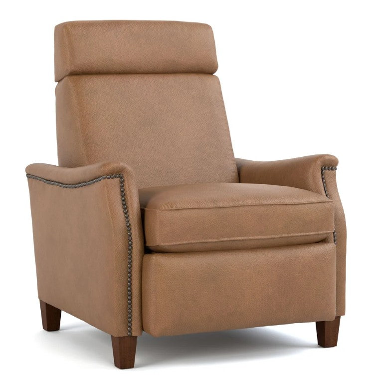 A tan leather recliner armchair with dark nailhead trim and dark brown wooden legs, shown from a three-quarter angle on a white background.