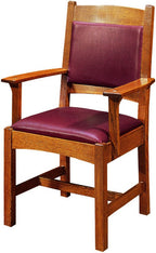 Wooden chair with purple cushion on a white background