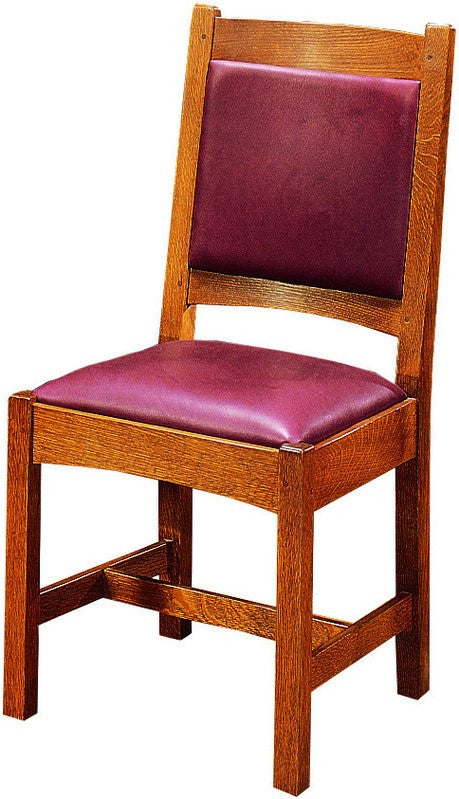 Wooden chair with purple cushioned seat and backrest on a white background