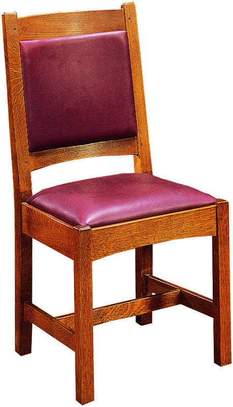 Wooden chair with purple cushioned seat and backrest on a white background