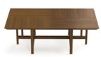 Wooden dining table on a white background