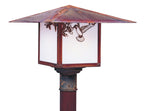 Decorative outdoor lamp with bird design on a white background