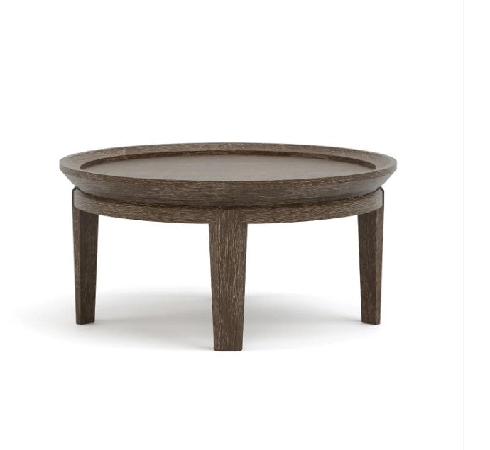 Round wooden coffee table on a white background