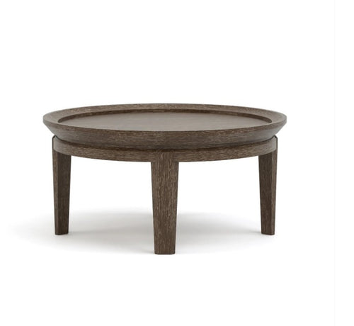 Round wooden coffee table on a white background