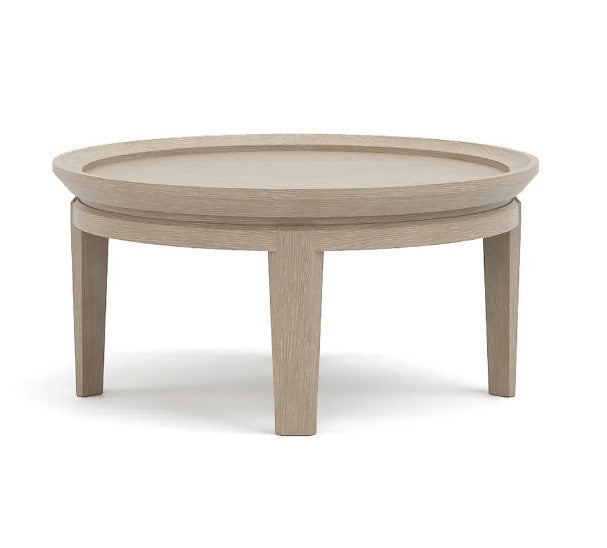 Round wooden coffee table on a white background