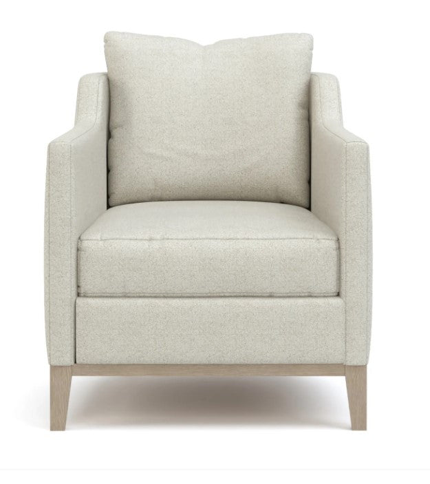 Light gray armchair on a white background