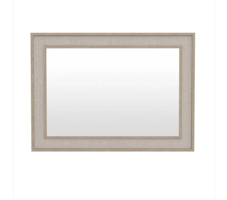 Rectangular mirror with a beige frame on a white background