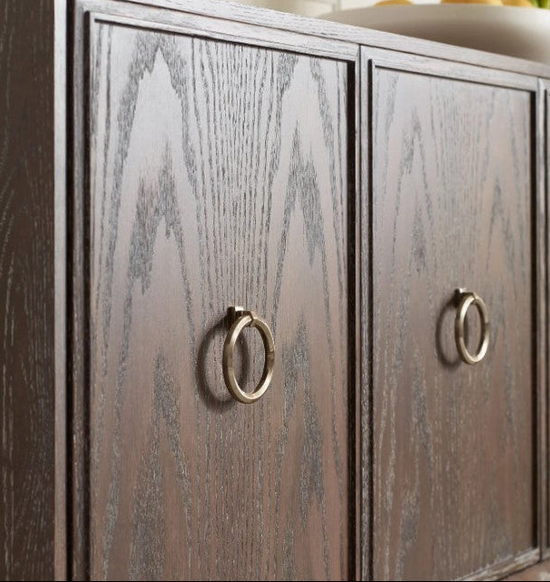 Wooden cabinet with metallic handles 