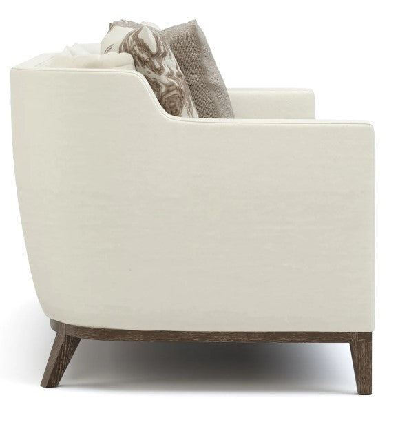 White armchair with wooden legs on a white background