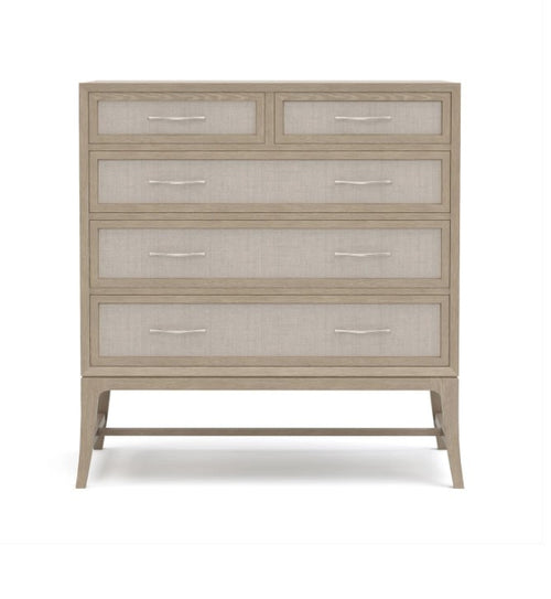 Beige dresser with glass panels on a white background