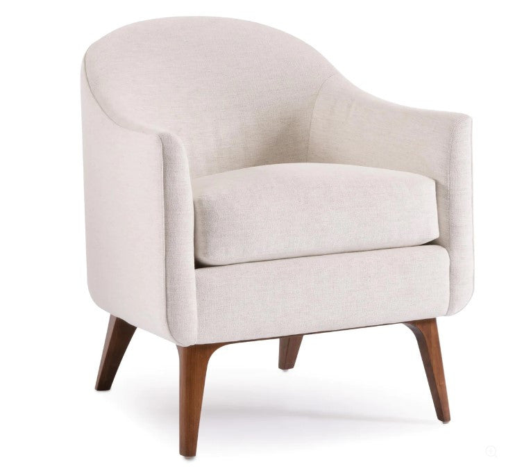 Beige armchair with wooden legs on a white background
