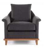 Gray armchair with a wooden base on a white background
