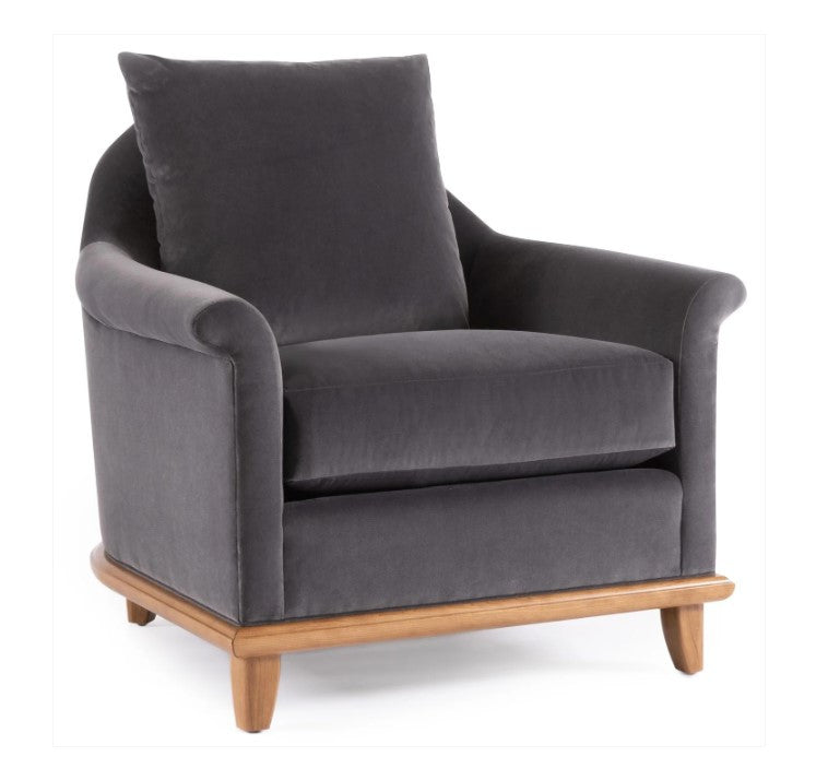 Gray armchair with wooden legs on a white background