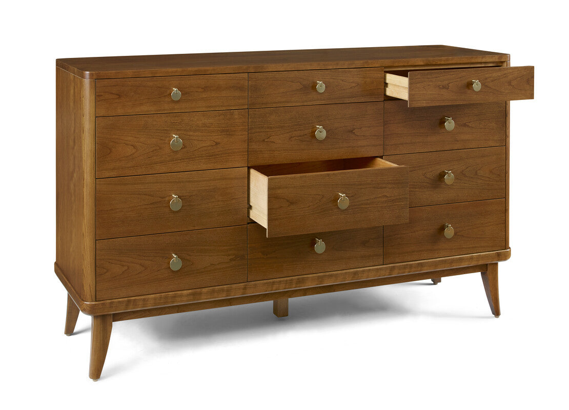 Wooden dresser with multiple drawers on a white background