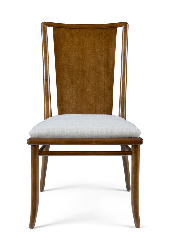 Wooden chair with a white cushion on a white background